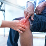 man with osteoarthritis in his knee osteoarthritis pain showing a doctor osteoarthritis pain